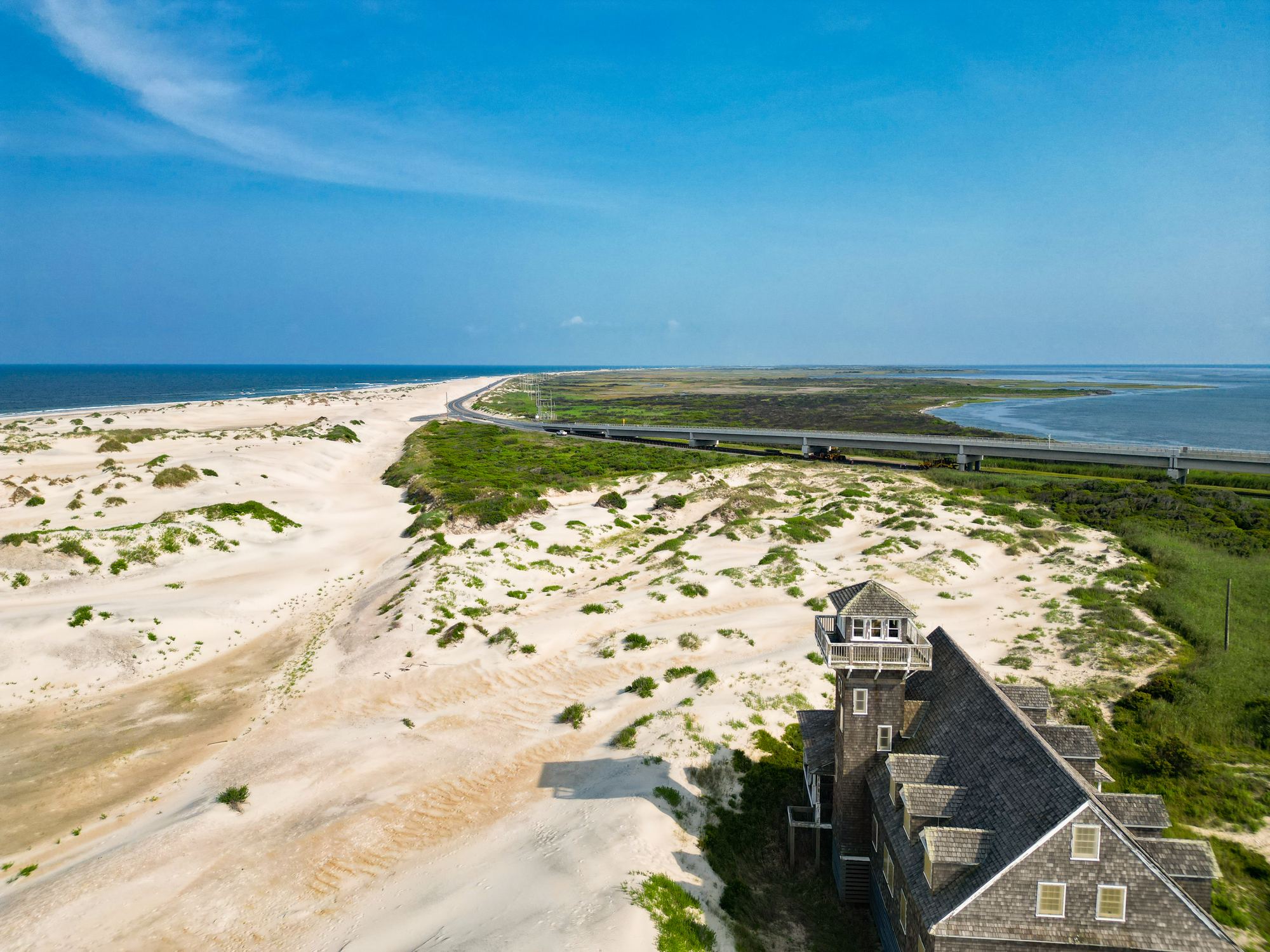 Aerial view of the historic Oregon Inlet Life-Saving Station among the dunes